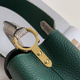 Handle and strap detail of structured everyday-luxe women's handbag – women's statement bag