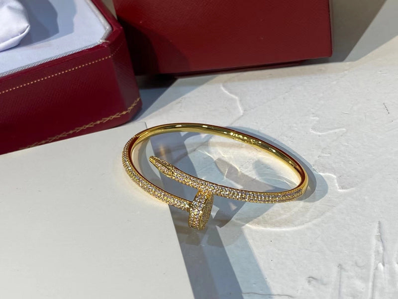 Close-up detail view of Cartier unisex jewelry piece