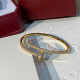 Close-up detail view of Cartier unisex jewelry piece