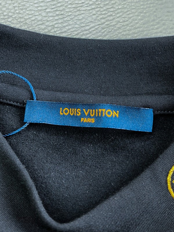 Back view of Louis Vuitton luxury clothing with everyday silhouette