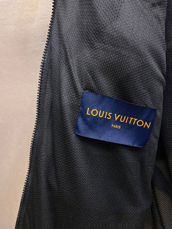 Close-up detail shot of Louis Vuitton luxury clothing with everyday silhouette