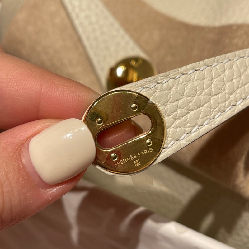 Side view of poised structured handbag