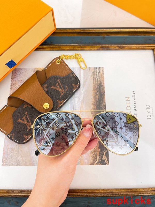 Close-up detail view of Louis Vuitton unisex sunglasses