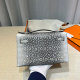 Side view of versatile structured handbag