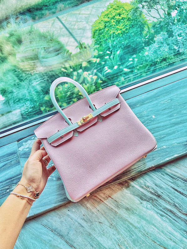Side view of classic structured handbag
