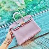 Side view of classic structured handbag