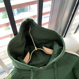 Front view of Gucci luxury clothing with logo-detail design