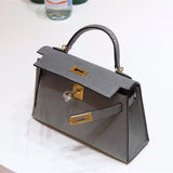 Side view of streamlined structured handbag