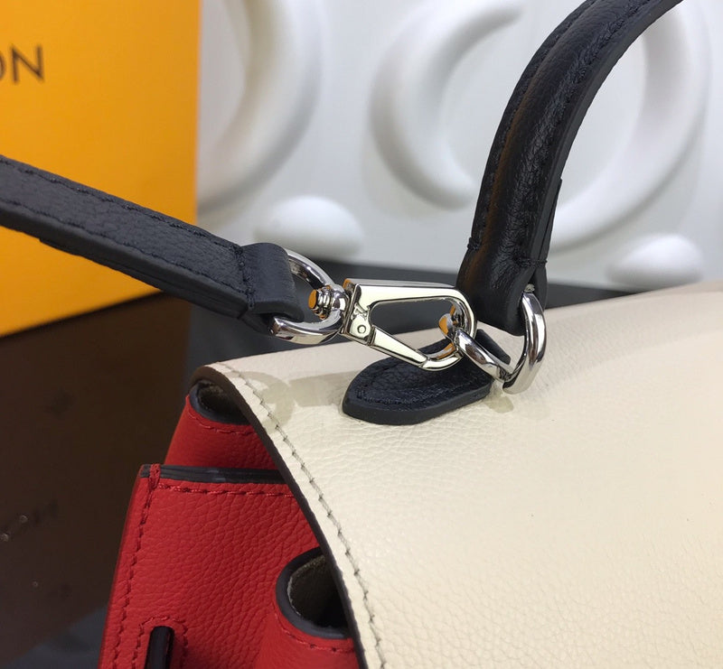 Back view of polished refined women's handbag – women's statement bag