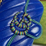 Handle and strap detail of chic statement women's handbag – women's everyday handbag