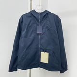 Close-up detail shot of Louis Vuitton luxury clothing with tailored silhouette
