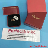 Side view of Cartier unisex jewelry piece