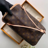Styled lifestyle shot of polished everyday-luxe women's handbag – women's luxury accessory