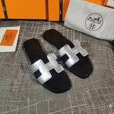 Hermès Tan Flat Thong Sandals - Heel Detail View