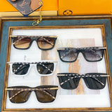 Close-up detail view of Louis Vuitton unisex sunglasses