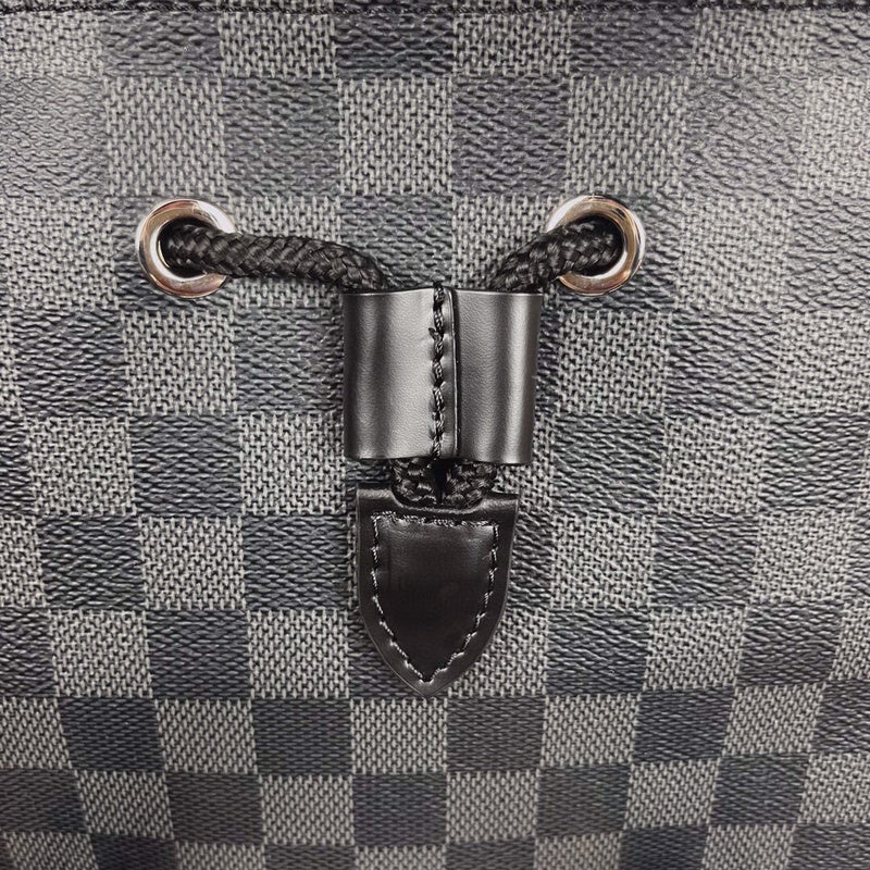 Back view of refined polished women's handbag – women's statement bag