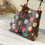 Side profile of modern classic women's handbag – women's luxury handbag