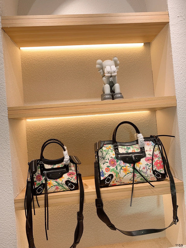 Ziva's Charm handbag – side angle view (one versatile size)