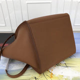 Handle and strap detail of chic statement women's handbag – women's statement bag