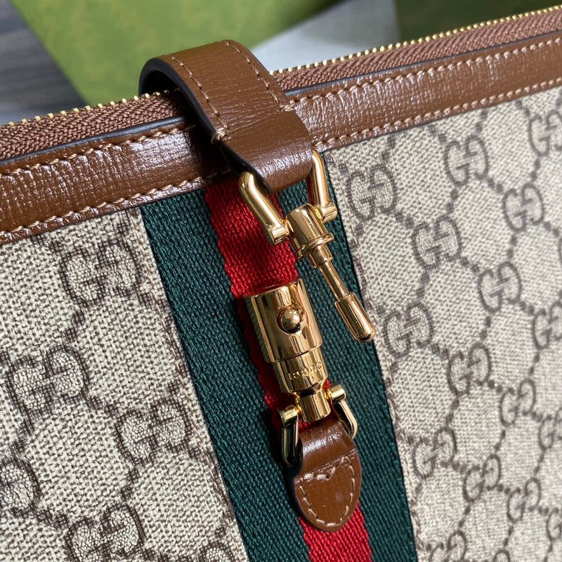 Styled lifestyle shot of structured sleek women's handbag – women's luxury handbag