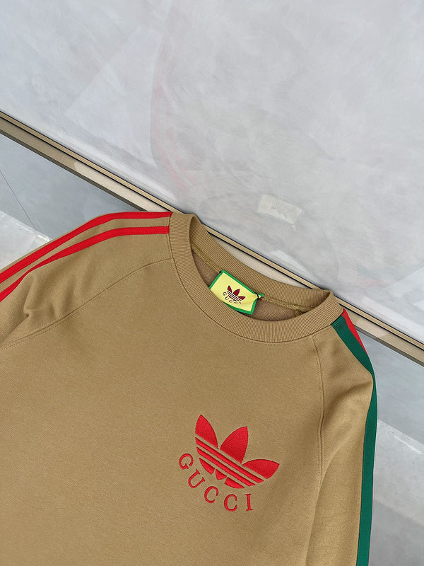 Close-up detail shot of Gucci luxury clothing with monogram-inspired silhouette