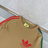 Close-up detail shot of Gucci luxury clothing with monogram-inspired silhouette