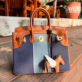 Sculpted handbag styled for everyday wear