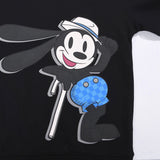 Flat lay presentation of Louis Vuitton luxury clothing with contemporary cut