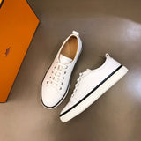 Hermès Tan Chunky Platform Sneakers - Angled View