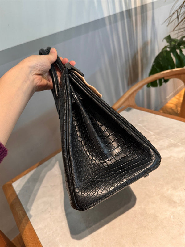 Side view of statement structured handbag
