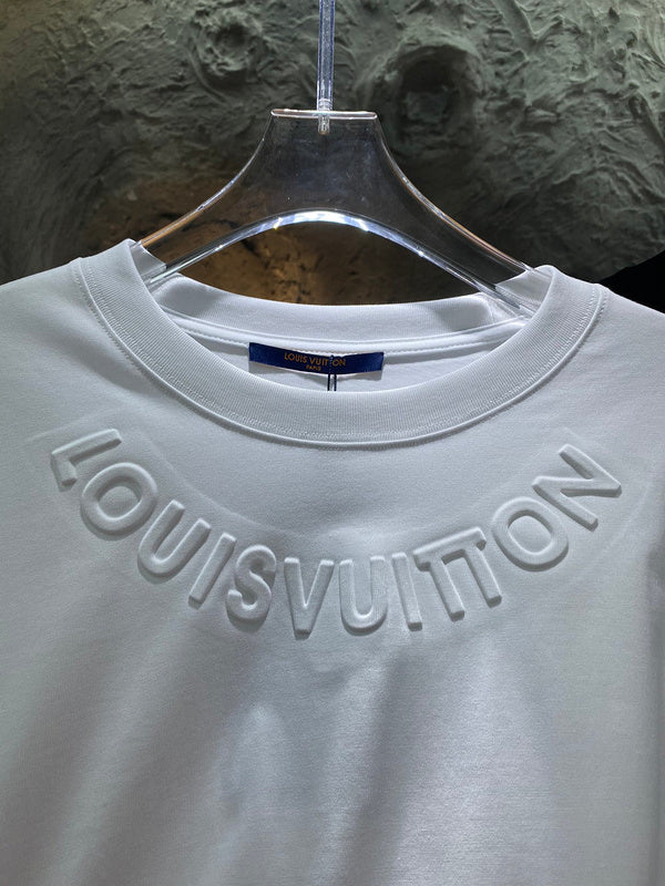 Flat lay presentation of Louis Vuitton cotton t-shirt with runway-inspired design
