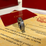 Close-up detail view of Cartier unisex jewelry piece