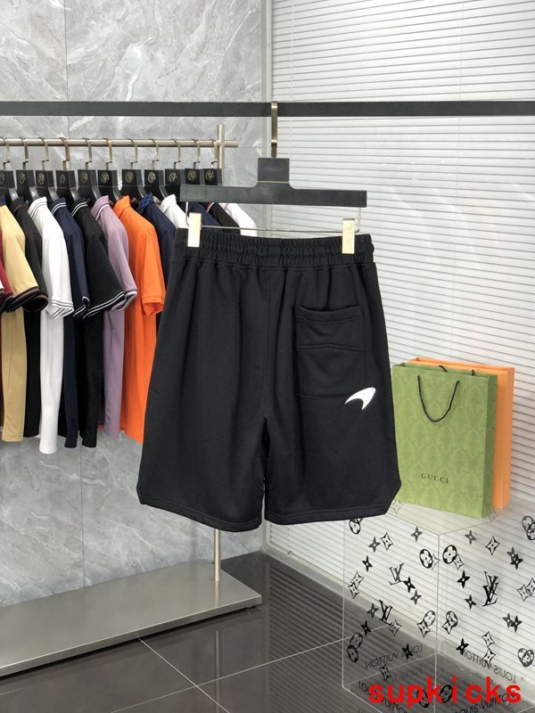 Side profile of Rhude luxury clothing with label-forward styling