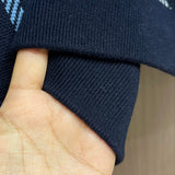 Close-up of Burberry designer clothing craftsmanship