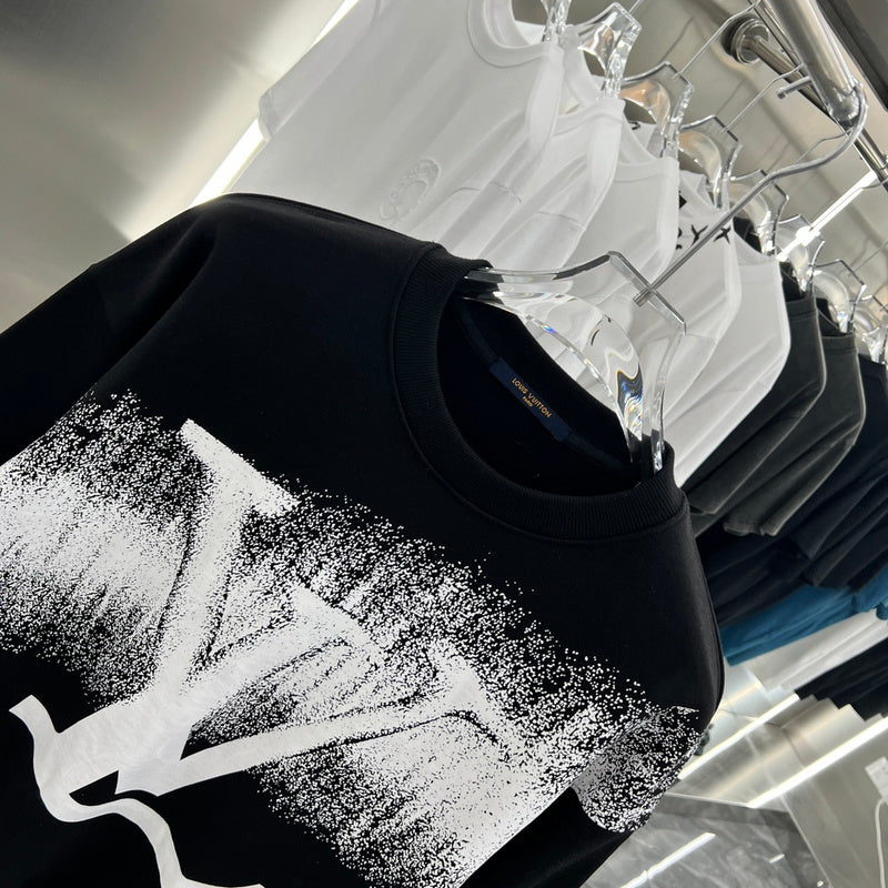 Close-up detail shot of Louis Vuitton luxury clothing with relaxed-fit cut