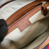 Side profile of classic polished women's handbag – women's everyday handbag