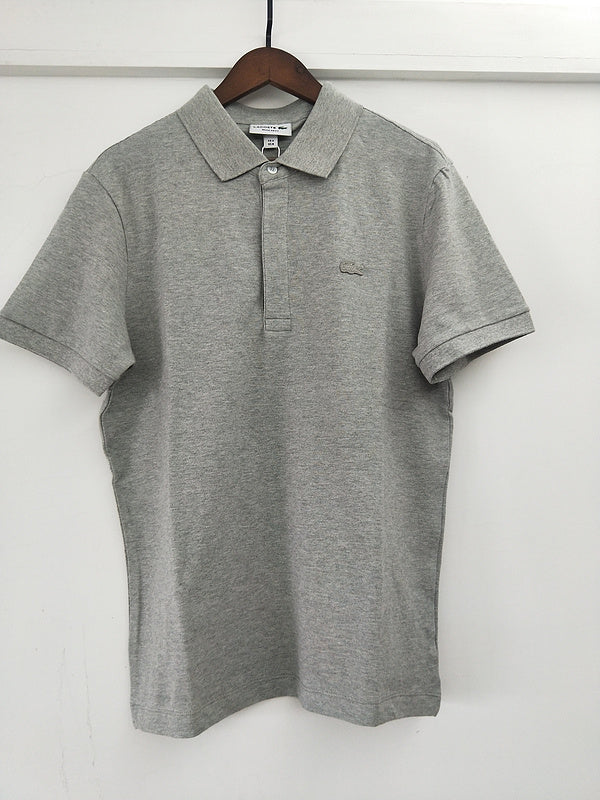 Front view of Lacoste luxury clothing with signature branding