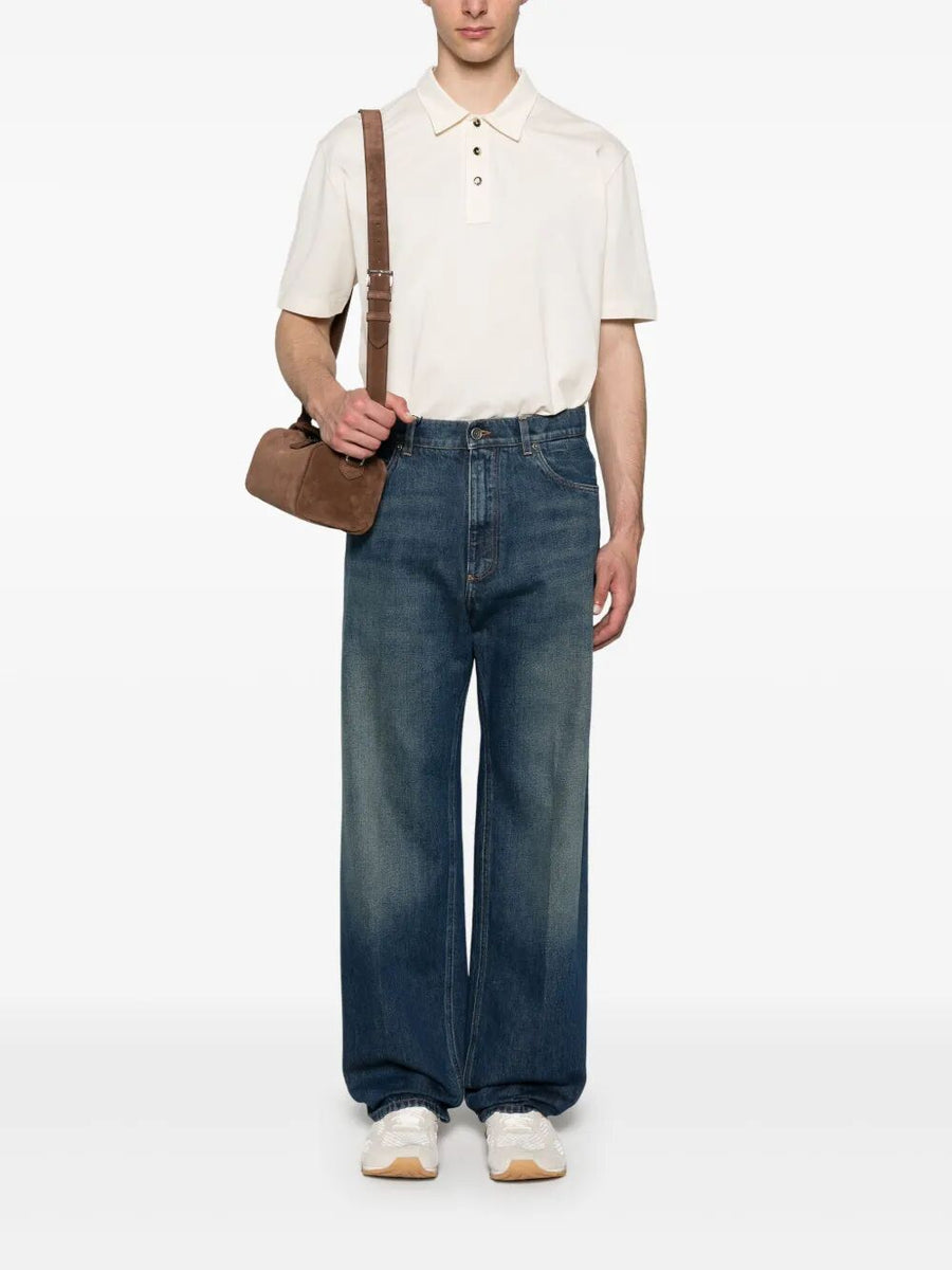 Close-up of Bottega Veneta clothing hardware and fine stitching