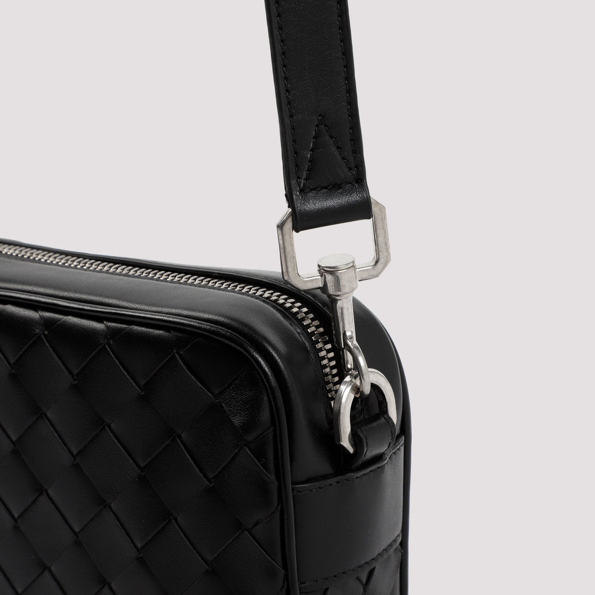 Close-up of Bottega Veneta shoulder bags hardware and fine stitching