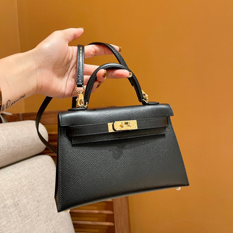 Side view of understated structured handbag