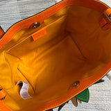 Side profile of elevated modern women's handbag – women's everyday handbag