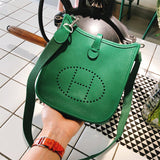  Signature shopper bag carried on shoulder 16