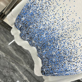 Close-up detail shot of Louis Vuitton luxury clothing with tailored silhouette