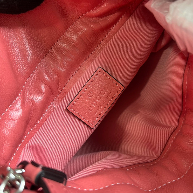 Side profile of modern refined women's handbag – women's luxury accessory