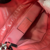 Side profile of modern refined women's handbag – women's luxury accessory