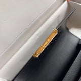 Side view of fluid structured handbag