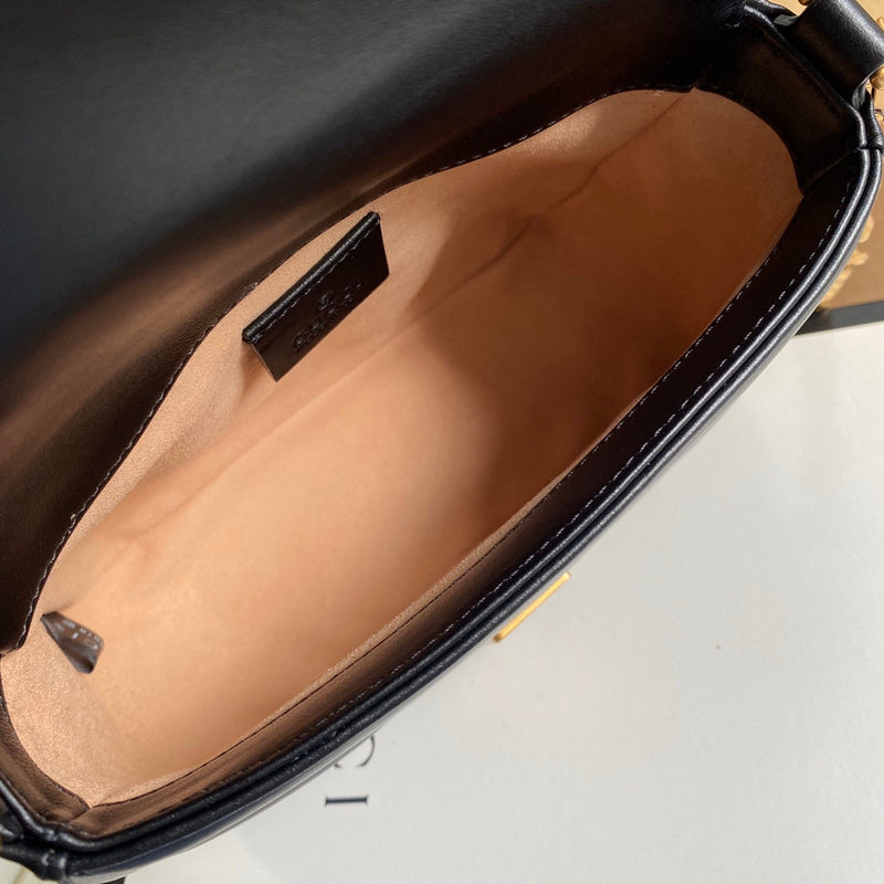 Close-up detail of chic polished women's handbag – women's designer-style accessory