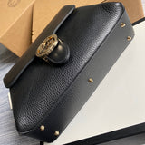 Back view of everyday-luxe sleek women's handbag – women's statement bag