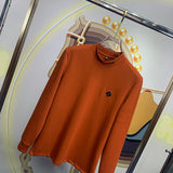 Side profile of Louis Vuitton luxury clothing with monogram-inspired silhouette