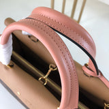 Handle and strap detail of chic signature women's handbag – women's luxury handbag